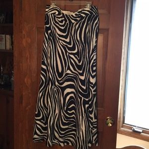 Long length Banana Republic skirt. Silky feel with inner lining. Back zip.